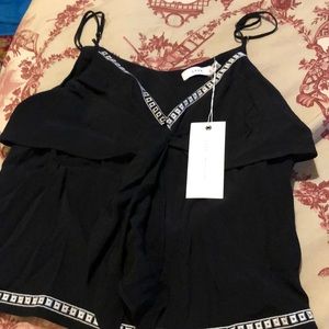 Lush brand two tier short top with V neck with tie front. Adjustable straps.